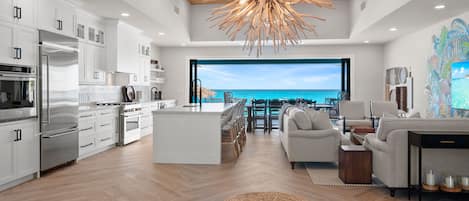 Aqua Blue's stunning living room, equipped to host 14 people comfortably!