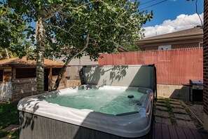 Relaxation awaits in the tranquil outdoor hot tub