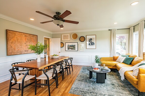 Mid-century modern oasis where the living room and dining area seamlessly blend