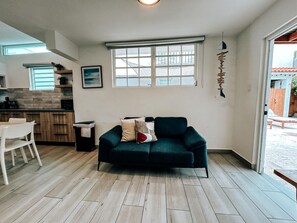 Discover ultimate comfort in our spacious, elegantly designed living room.