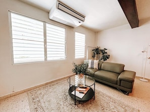 Stay cool and comfortable in our luxurious living room, complete with air conditioning for ultimate relaxation