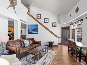 Living Room / Sleep Sofa / Dining Area / Staircase to Loft