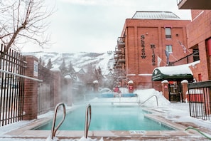 Outdoor heated pool w/ ski run views!