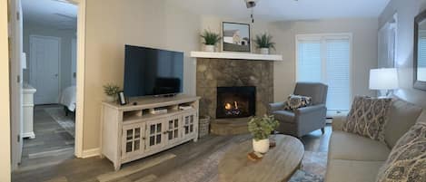 Living room with cozy fireplace.