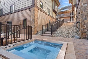 Enjoy a hot soak after a day of adventures in the new hot tub at the Dolomite Townhomes.