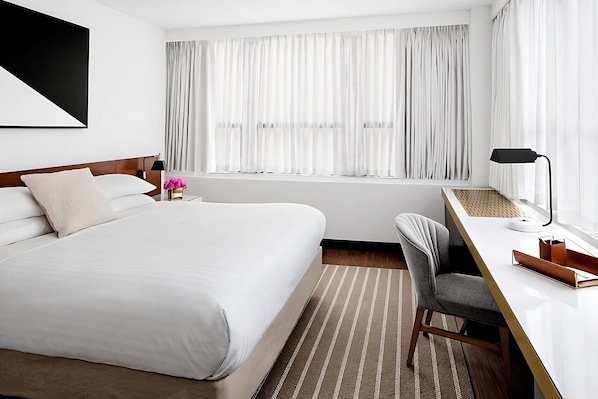 Unit with King bed. Exact unit will be assigned upon arrival. Views, colors, and decor may vary.