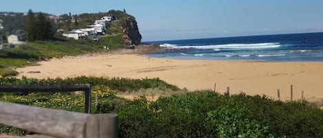 Photo taken from Copacabana Beach looking toward Captain Cook Lookout.  