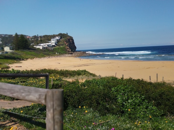 Photo taken from Copacabana Beach looking toward Captain Cook Lookout.  