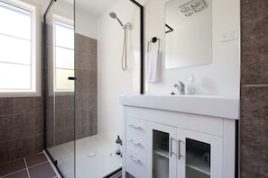 Contemporary bathroom featuring a generous walk-in shower