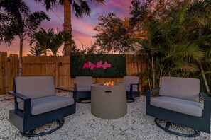 Fire pit with swivel chairs