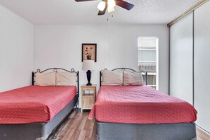 2 Full size beds in bedroom