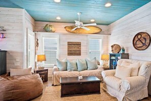 Sink into comfort with ample plush seating made for lounging, chatting, and kicking back after a day by the coast. There’s plenty of room for everyone to relax and unwind!

