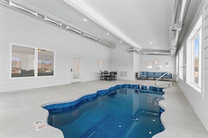 Our private, heated, indoor pool with view of the lake is your private paradise.