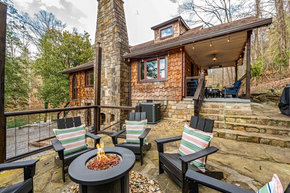 Firepit with comfortable seating in a private setting.