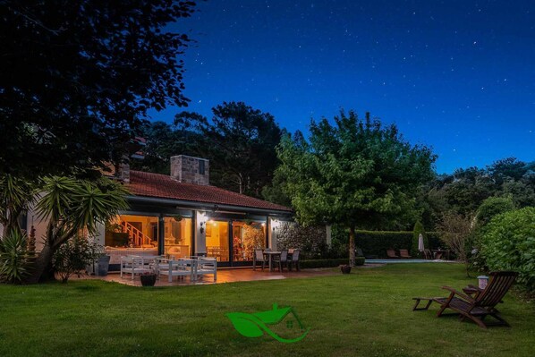 Property building,Night,Garden,Balcony/Terrace,Garden view