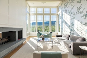 Imagine yourself relaxing on the chaise with the view of the mountains behind you