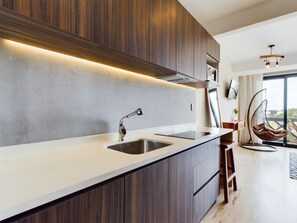 "Cook in style: contemporary kitchen w/ streamlined minimalist charm.