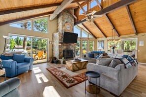 Large living area with open-beam ceilings