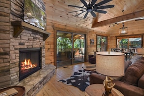 Enjoy the open concept living space with gas fireplace plenty of seating!