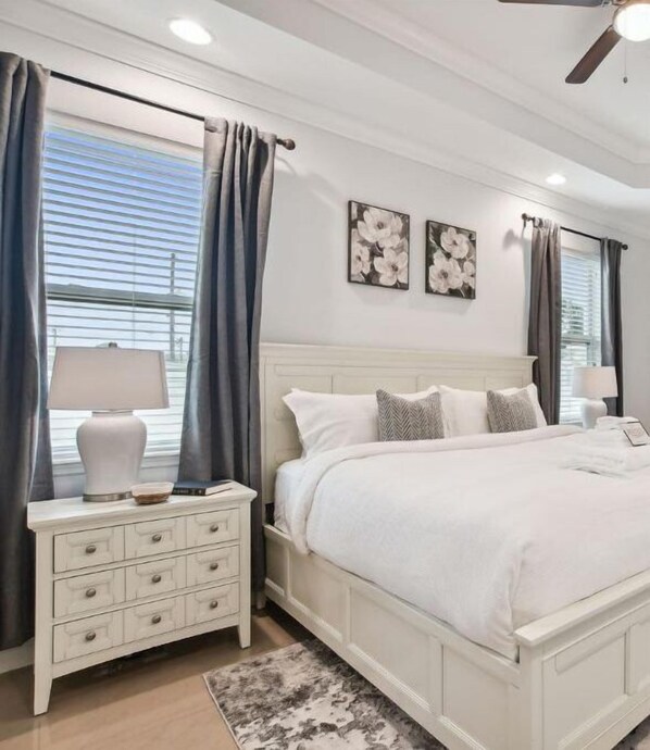 Enjoy a luxurious design throughout the home, featuring high ceilings, granite countertops, and all-new furnishings. Each guest bedroom is equipped with a plush queen-sized bed, while the master suite offers a spacious king-sized bed with a private ensuite.