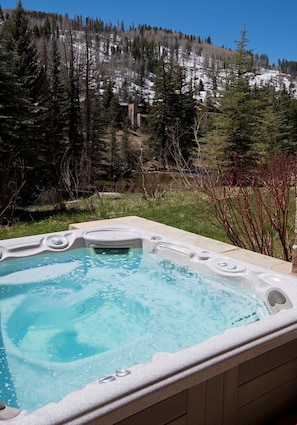 Soak sore muscles after a long day on the slopes in the private hot tub.