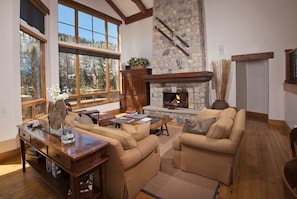 Take a seat in the comfortable living area and warm up in front of the fireplace.