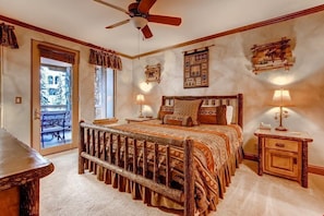 Get a good night's sleep in the master bedroom. Bedding configurations vary.