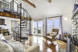 Open living dining kitchen area with full views out over Lake Michigan