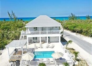 Brand new home with prestigious Banks Road location just steps to Poponi Beach.