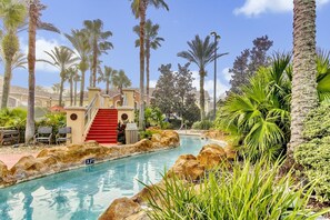 Escape to a serene oasis with scenic artificial lakes and lush greenery at Regal Palms Resort. Perfect for a relaxing getaway.