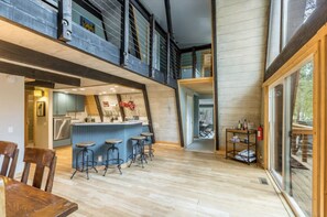 Open concept dining area off kitchen along with gas fireplace!