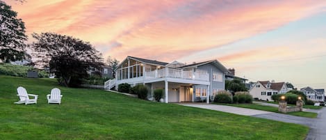 Large side yard and house at sunset