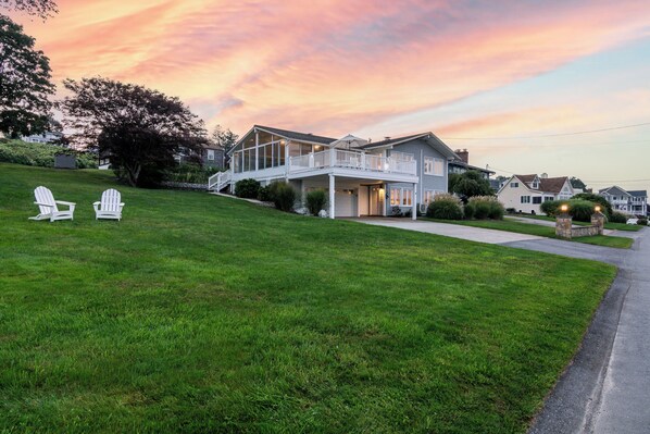 Large side yard and house at sunset