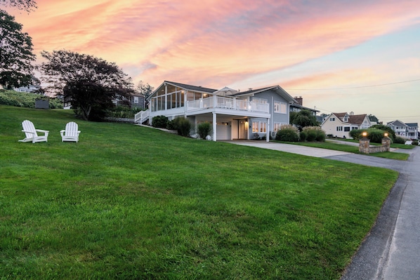 Large side yard and house at sunset