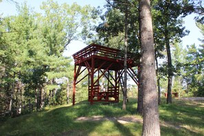 Viewing platform with picnic swing beneath