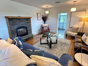 Main level living room with gas fireplace