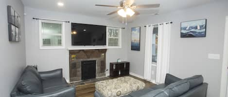 Family room: Spacious layout. 
Put your feet up, enjoy FireTv, and RELAX.