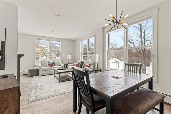 Beautiful views of mountain and sunset from this corner-unit's living room.