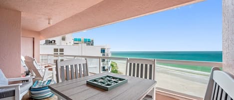 Spacious balcony overlooking the aqua water of the Gulf of Mexico