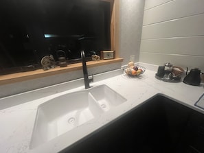 New windows, sink & quartz counters