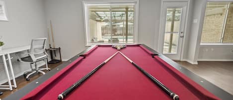 Enjoy a game of billiards while looking out to the pool. Enjoy quality fun time!