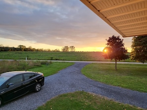 Oval driveway with lots of parking space and room for the boat or trailer.