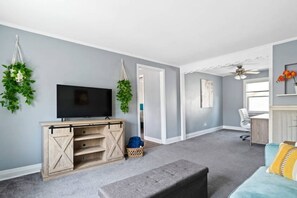 Open living room with work station!
