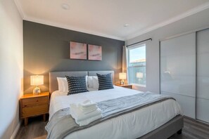 Dream in comfort on our king bed with a premium memory foam mattress and wake up to your favorite shows on the widescreen TV.