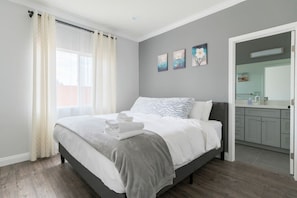 Sleep like royalty in our luxurious Master Bedroom with king-sized bed, hypoallergenic sheets, and private bathroom.