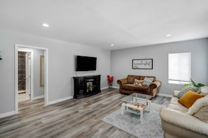 Gather with loved ones and create memories in our spacious living room, designed for your ultimate comfort.