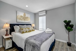Experience the perfect night's sleep on our plush queen-sized bed, complete with your choice of climate control.