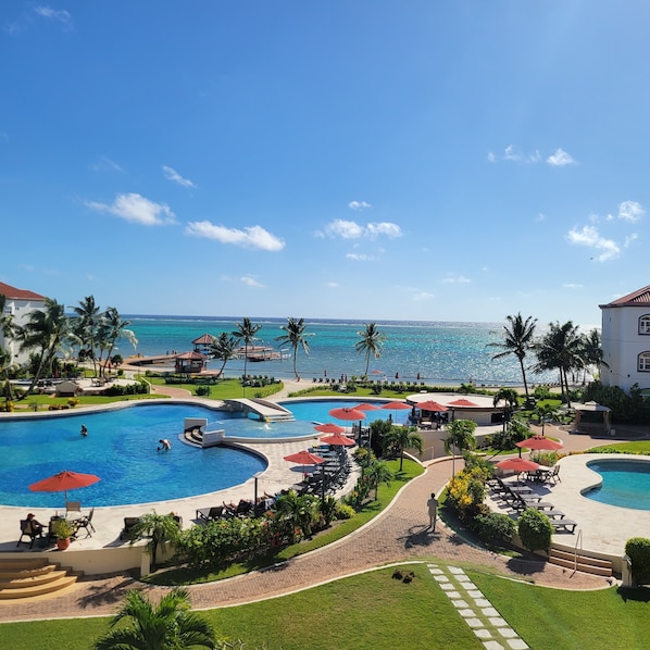 Beautiful view of main pool and ocean from patio