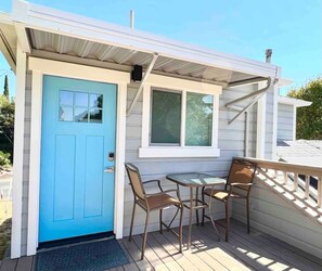 The outdoor furniture on the deck is the perfect space to sip on a morning coffee and get some fresh air.