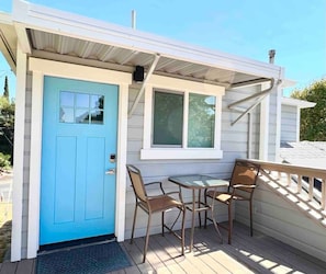 The outdoor furniture on the deck is the perfect space to sip on a morning coffee and get some fresh air.